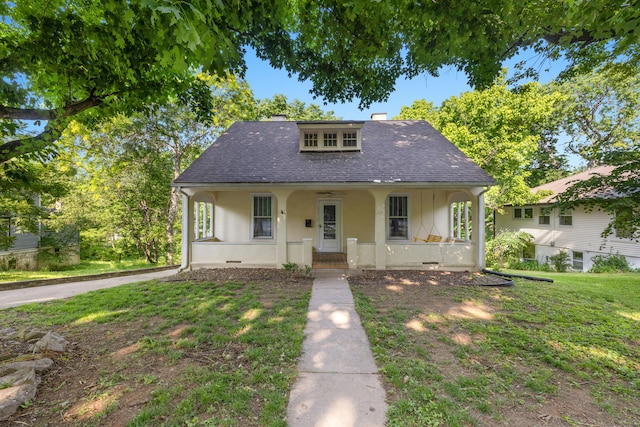 611 Old Shakertown Rd, Danville, KY 40422 - bungalow with a porch, stucco siding, roof with shingles, and a front lawn