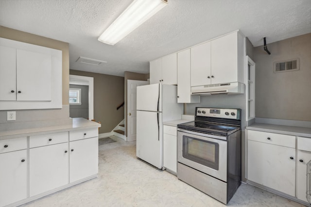 611 Old Shakertown Rd, Danville, KY 40422 - kitchen featuring electric range, under cabinet range hood, freestanding refrigerator, light countertops, and a textured ceiling