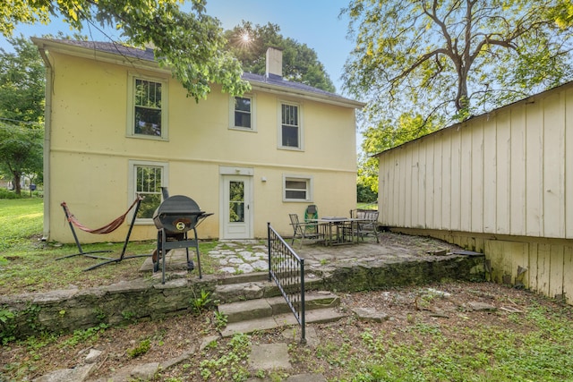 611 Old Shakertown Rd, Danville, KY 40422 - rear view of house with a patio area, stucco siding, and a shingled roof