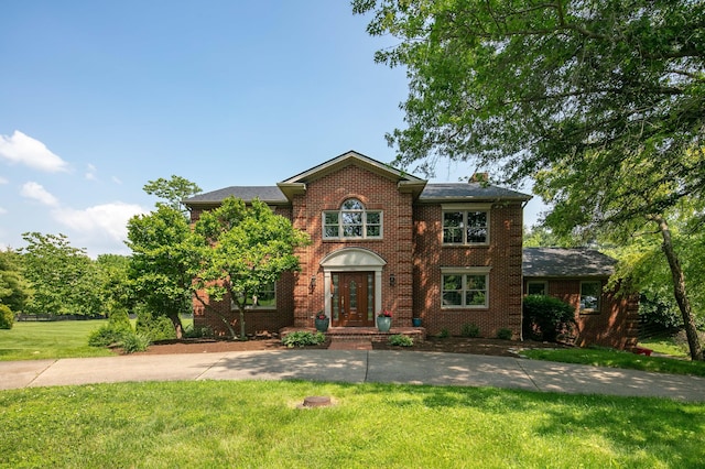 202 Thoroughbred Ln, Nicholasville, KY 40356 - view of front of home with a front yard and brick siding