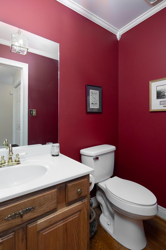 202 Thoroughbred Ln, Nicholasville, KY 40356 - bathroom featuring toilet, vanity, wood finished floors, crown molding, and baseboards