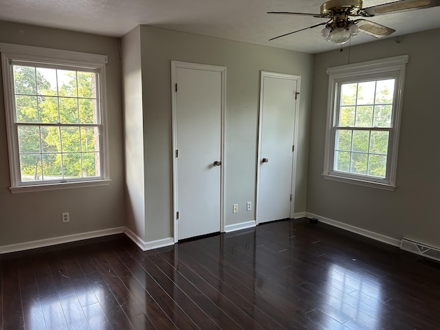 522 Countryside Cir, Mount Vernon, KY 40456 - unfurnished bedroom with baseboards and multiple windows