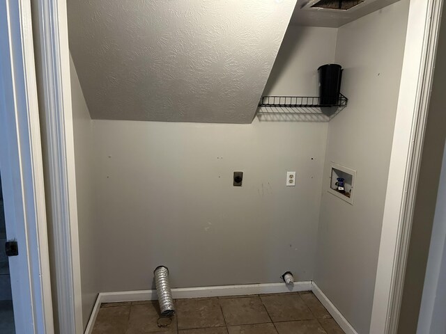 522 Countryside Cir, Mount Vernon, KY 40456 - washroom with hookup for an electric dryer, hookup for a washing machine, baseboards, tile patterned floors, and a textured ceiling