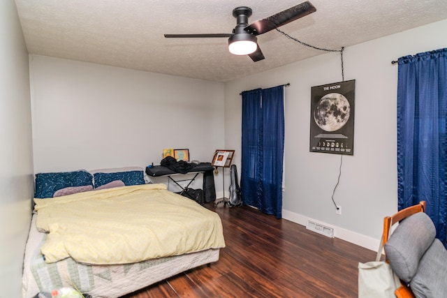 50 Barnett St, Hustonville, KY 40437 - bedroom with wood finished floors, a textured ceiling, and ceiling fan