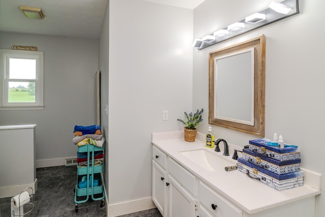 50 Barnett St, Hustonville, KY 40437 - bathroom with vanity and baseboards