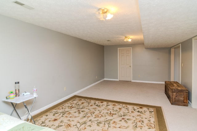 50 Barnett St, Hustonville, KY 40437 - finished below grade area with carpet floors and a textured ceiling