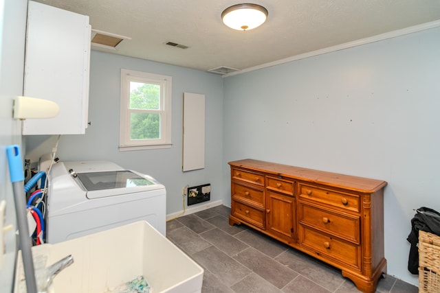 50 Barnett St, Hustonville, KY 40437 - washroom with washer and clothes dryer, attic access, and a textured ceiling