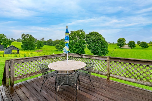50 Barnett St, Hustonville, KY 40437 - wooden terrace with outdoor dining area and a lawn