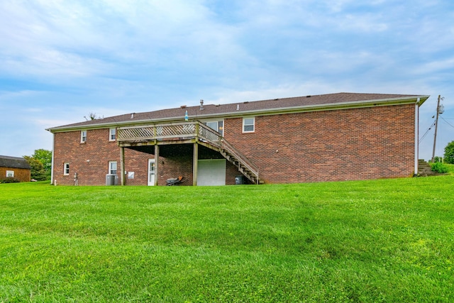50 Barnett St, Hustonville, KY 40437 - back of house with a wooden deck, a lawn, stairway, and brick siding