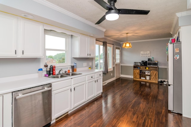 50 Barnett St, Hustonville, KY 40437 - kitchen with dishwasher, freestanding refrigerator, white cabinetry, ornamental molding, and dark wood-type flooring