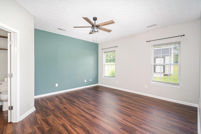 110 Seth Way, Georgetown, KY 40324 - unfurnished bedroom featuring wood finished floors, baseboards, a textured ceiling, ceiling fan, and ensuite bath