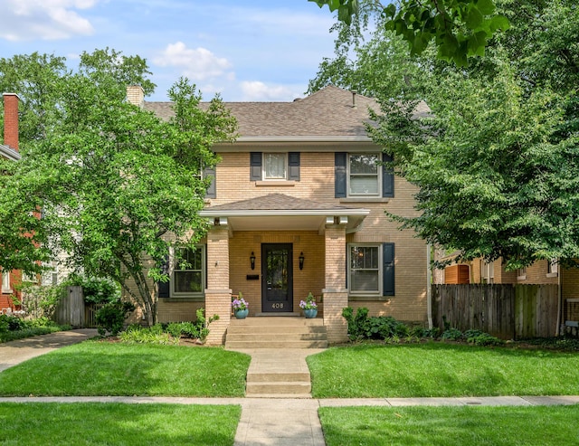 406 Dudley Rd, Lexington, KY 40502 - view of front facade featuring a chimney, brick siding, and a shingled roof