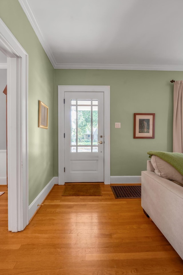 406 Dudley Rd, Lexington, KY 40502 - entryway featuring crown molding, baseboards, and light wood finished floors