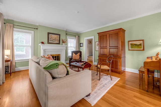 406 Dudley Rd, Lexington, KY 40502 - living area featuring a brick fireplace, light wood finished floors, crown molding, and baseboards
