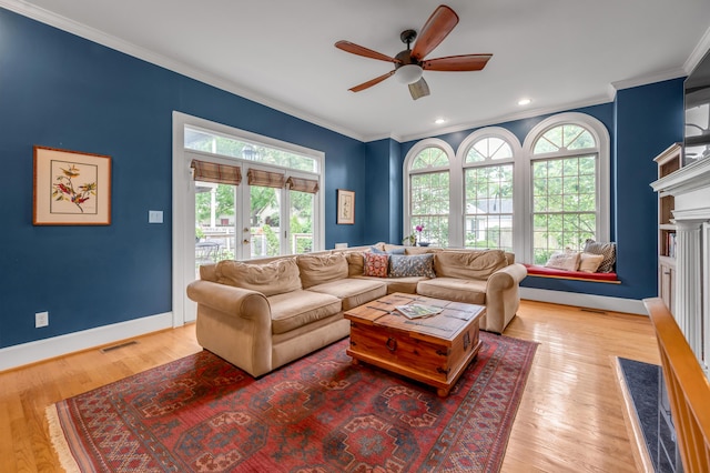 406 Dudley Rd, Lexington, KY 40502 - living area with a ceiling fan, crown molding, healthy amount of natural light, light wood-type flooring, and baseboards