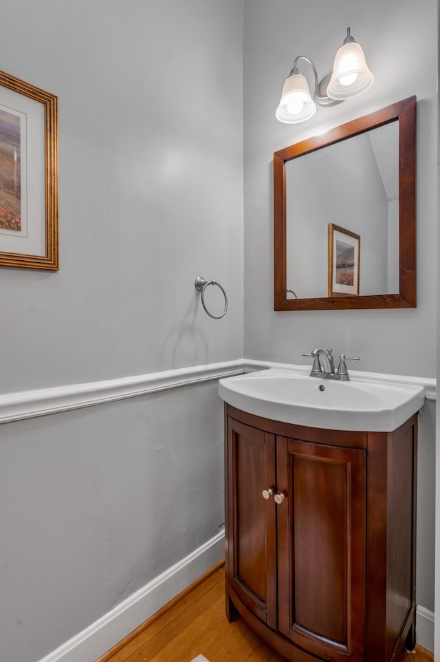 406 Dudley Rd, Lexington, KY 40502 - bathroom featuring vanity, wood finished floors, and baseboards