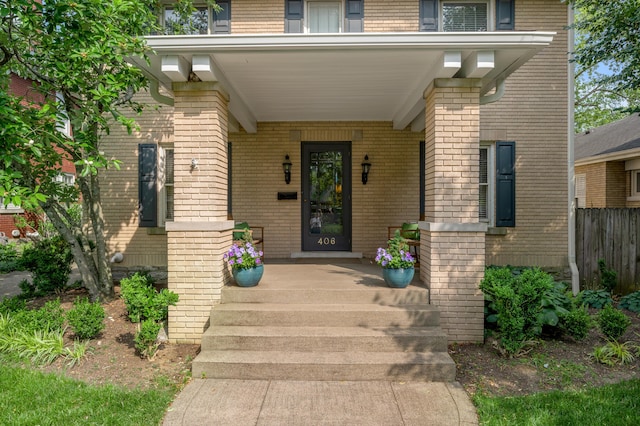 406 Dudley Rd, Lexington, KY 40502 - doorway to property featuring brick siding and a porch