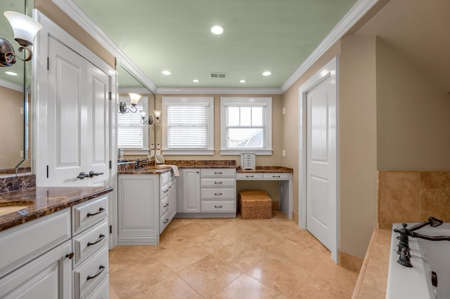 406 Dudley Rd, Lexington, KY 40502 - full bathroom featuring crown molding, two vanities, a bathtub, and recessed lighting