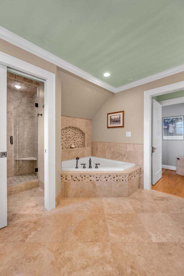 406 Dudley Rd, Lexington, KY 40502 - bathroom with a bath, a shower stall, crown molding, tile patterned floors, and vaulted ceiling