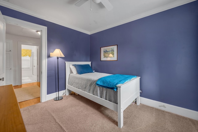 406 Dudley Rd, Lexington, KY 40502 - carpeted bedroom with baseboards, ornamental molding, and ceiling fan