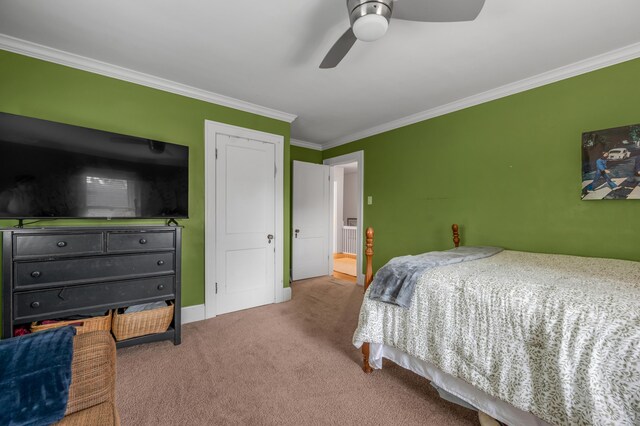 406 Dudley Rd, Lexington, KY 40502 - carpeted bedroom with ornamental molding, a ceiling fan, and baseboards