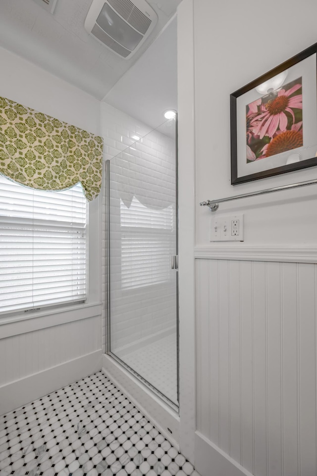 406 Dudley Rd, Lexington, KY 40502 - bathroom with a stall shower, wainscoting, and tile patterned floors