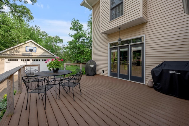 406 Dudley Rd, Lexington, KY 40502 - deck with a grill, outdoor dining space, and an outbuilding