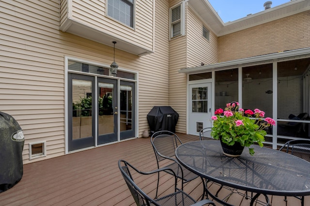 406 Dudley Rd, Lexington, KY 40502 - deck featuring outdoor dining space, a grill, and a sunroom