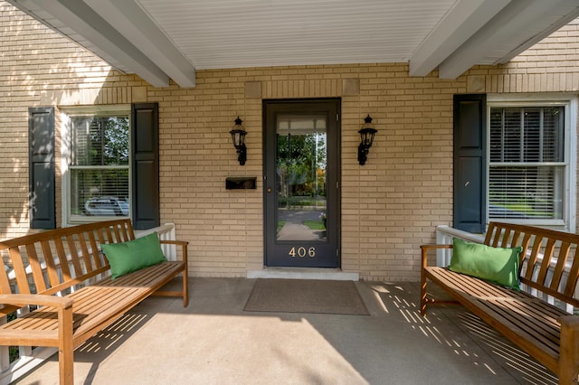 406 Dudley Rd, Lexington, KY 40502 - property entrance featuring a porch and brick siding