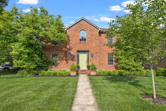 850 Charwood Dr, Lexington, KY 40515 - traditional-style house with a front yard and brick siding