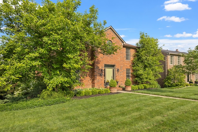 850 Charwood Dr, Lexington, KY 40515 - view of front facade featuring brick siding and a front yard