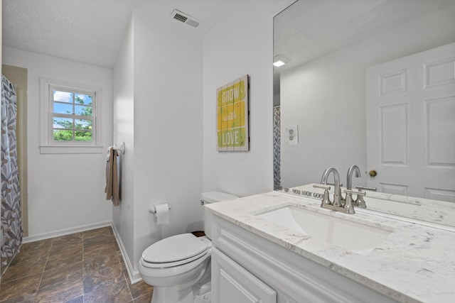 850 Charwood Dr, Lexington, KY 40515 - bathroom featuring vanity, baseboards, toilet, and stone finish floors