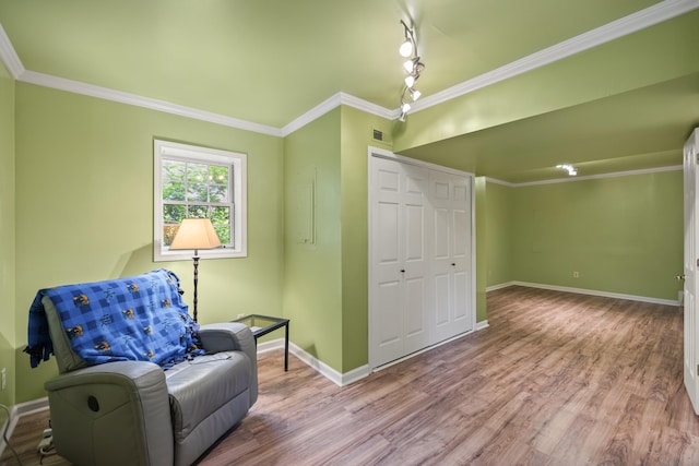 850 Charwood Dr, Lexington, KY 40515 - sitting room with wood finished floors, baseboards, and ornamental molding