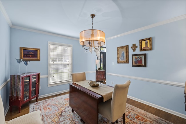 850 Charwood Dr, Lexington, KY 40515 - dining room featuring a chandelier, ornamental molding, baseboards, and wood finished floors
