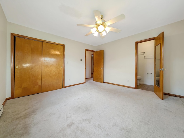 227 Mimosa Ave, Somerset, KY 42503 - unfurnished bedroom featuring baseboards, light colored carpet, a closet, ensuite bath, and a ceiling fan
