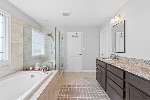 103 Snap Hook Ct, Georgetown, KY 40324 - full bath with a bath, a shower stall, vanity, and healthy amount of natural light