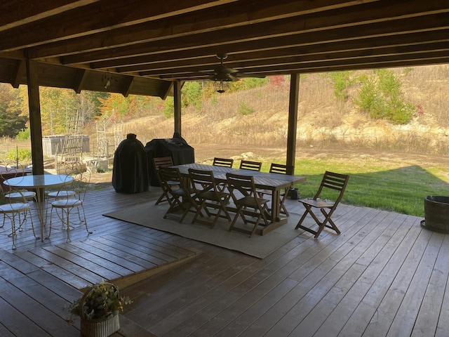 431 Harold Luke Rd, Campton, KY 41301 - deck featuring outdoor dining area, ceiling fan, a lawn, and area for grilling