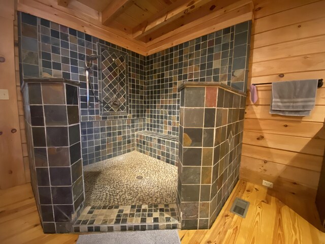 431 Harold Luke Rd, Campton, KY 41301 - full bath with a tile shower, wood finished floors, and beamed ceiling