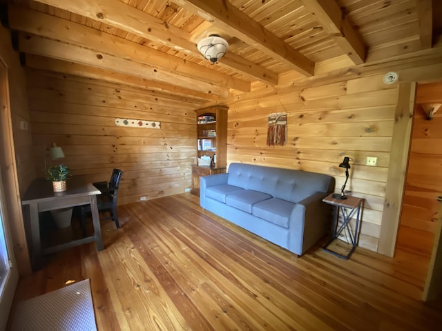 431 Harold Luke Rd, Campton, KY 41301 - living room featuring wood-type flooring, wood ceiling with exposed beams, and wooden walls