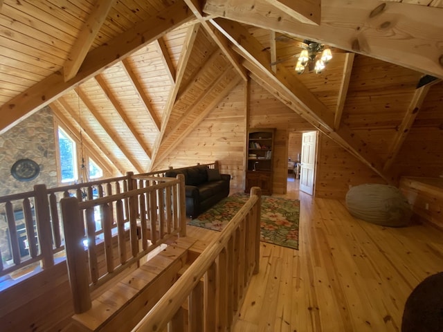 431 Harold Luke Rd, Campton, KY 41301 - hallway with wood ceiling, an upstairs landing, light wood-style flooring, and wood walls