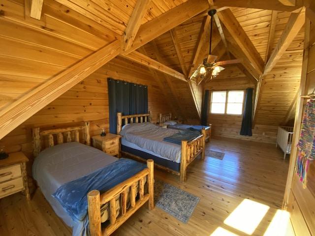 431 Harold Luke Rd, Campton, KY 41301 - bedroom with wooden walls, wood ceiling, radiator, and hardwood / wood-style flooring