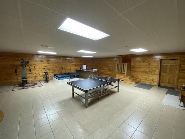 431 Harold Luke Rd, Campton, KY 41301 - recreation room featuring a drop ceiling, wooden walls, and light tile patterned floors