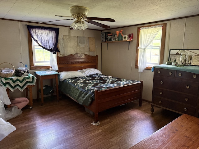 1034 Duncan Valley Rd, Monticello, KY 42633 - bedroom featuring ornamental molding, dark wood finished floors, and ceiling fan