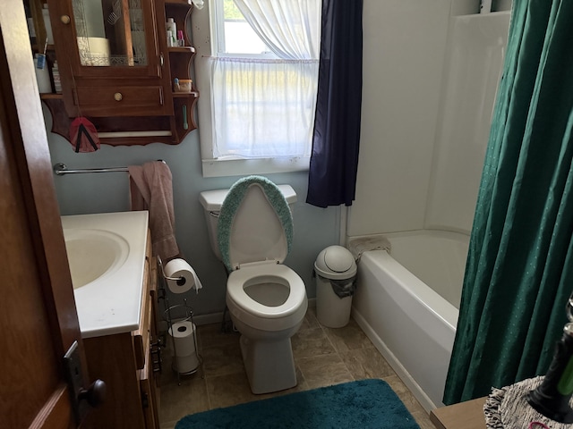 1034 Duncan Valley Rd, Monticello, KY 42633 - bathroom with vanity, toilet, shower / bath combo with shower curtain, and tile patterned floors