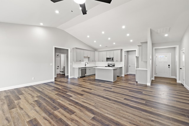 1038 Tamworth Ln, Frankfort, KY 40601 - unfurnished living room featuring a sink, ceiling fan, vaulted ceiling, recessed lighting, and dark wood-style flooring
