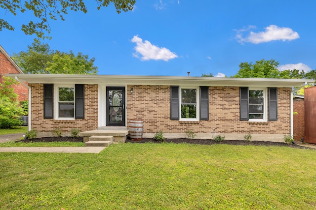 966 Jairus Dr, Lexington, KY 40515 - single story home with a front yard and brick siding