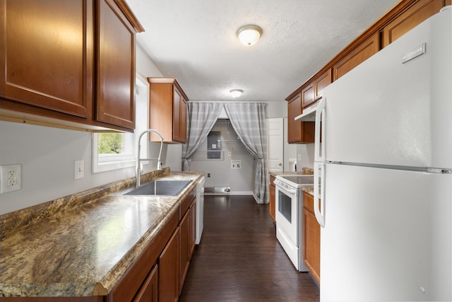 966 Jairus Dr, Lexington, KY 40515 - kitchen featuring white appliances, a sink, dark wood-type flooring, and brown cabinetry