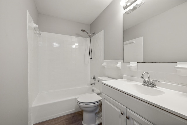 966 Jairus Dr, Lexington, KY 40515 - bathroom featuring vanity, bathtub / shower combination, wood finished floors, toilet, and tile walls