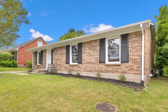 966 Jairus Dr, Lexington, KY 40515 - ranch-style home with a front lawn and brick siding