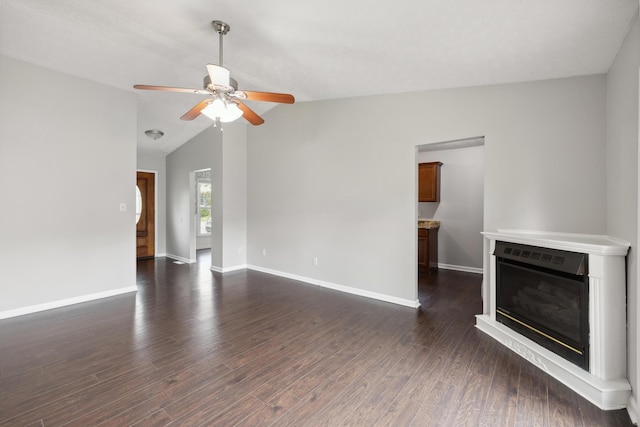 966 Jairus Dr, Lexington, KY 40515 - unfurnished living room with ceiling fan, dark wood-style flooring, lofted ceiling, baseboards, and a glass covered fireplace